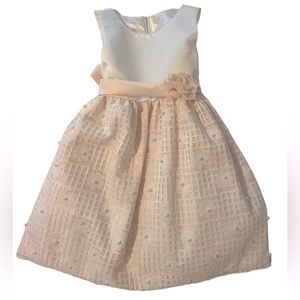 For every little princess.  Satin top pearl and lace embellished skirt